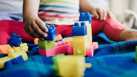 baby playing with blocks
